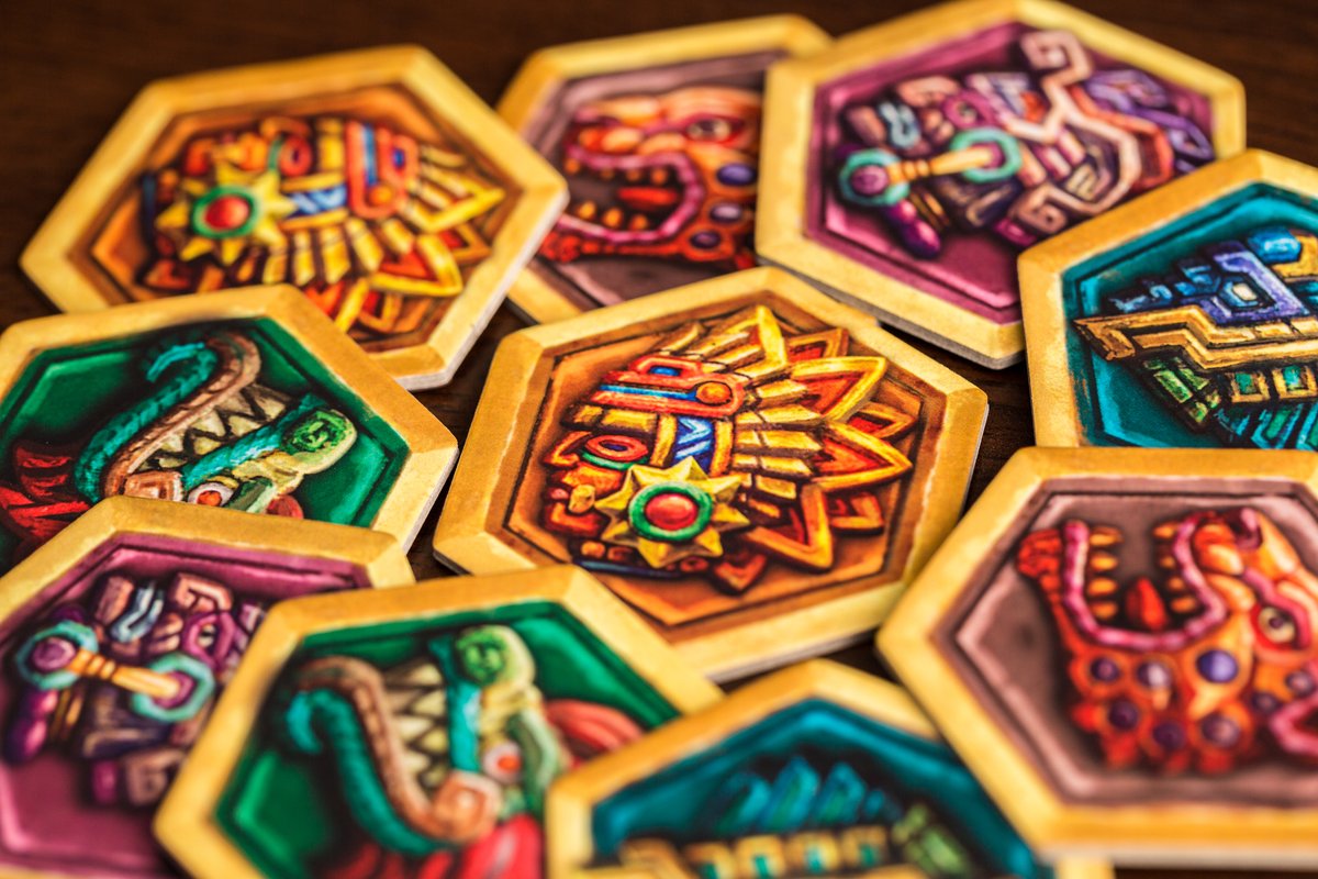 Macro close-up of vibrant Mayan glyph hexagonal tiles